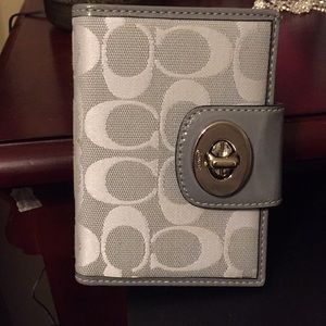 Silver coach wallet